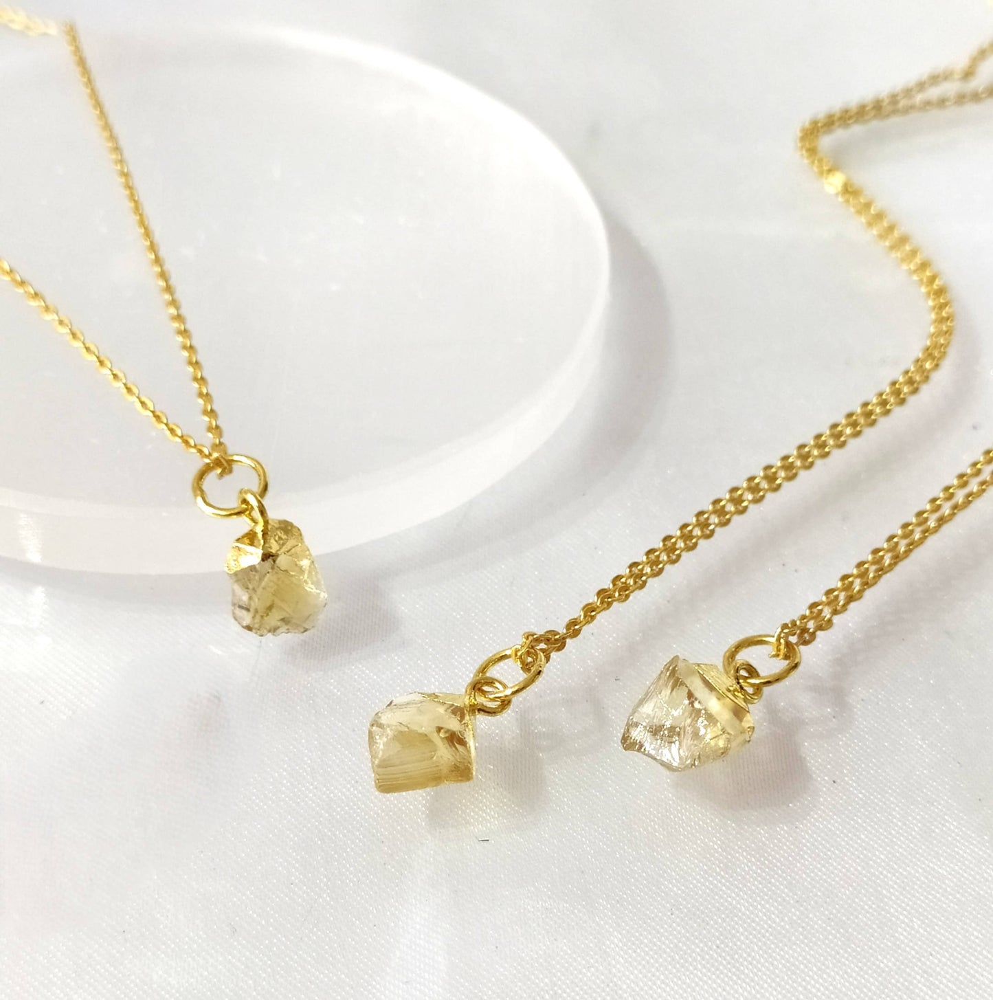 3 Solar energy necklaces with natural raw citrine crystal front view