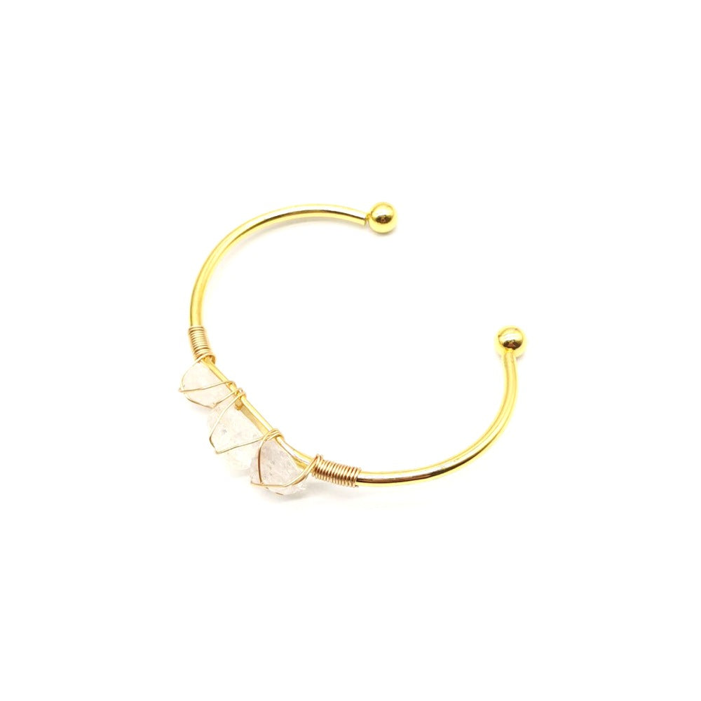 Handmade braided bracelet with [color] natural gemstone crystals