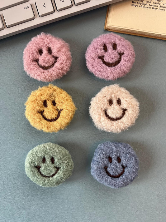 all Whimsical plush smiley phone grip front view