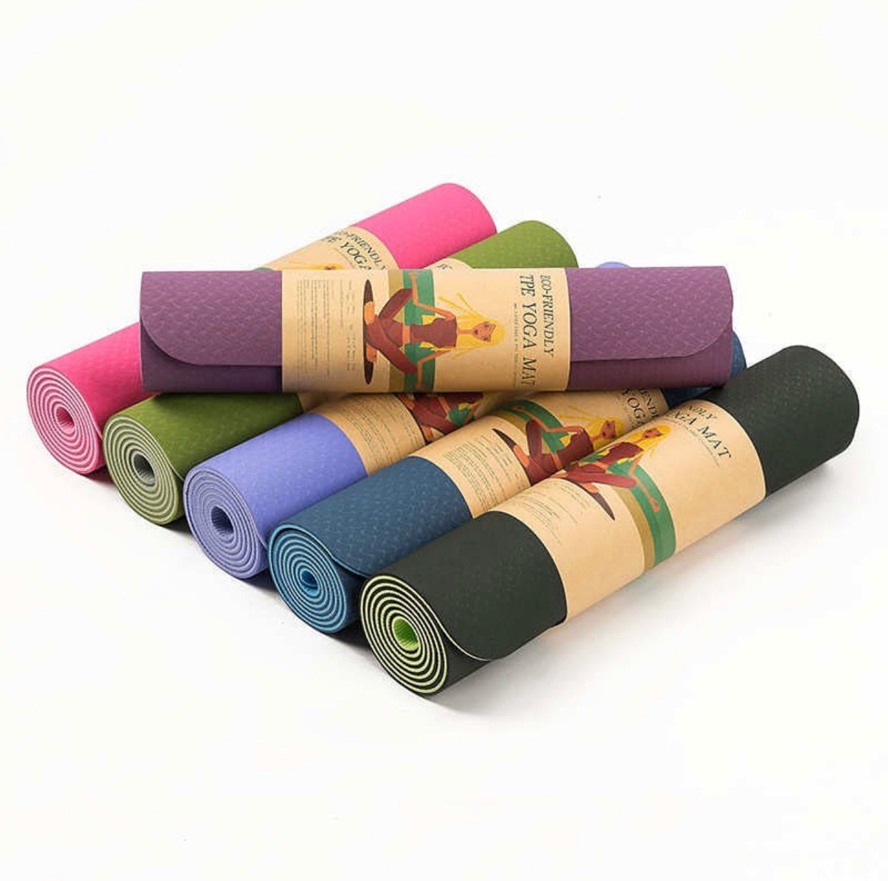 Set of colorful yoga mats with branded labels on a white background