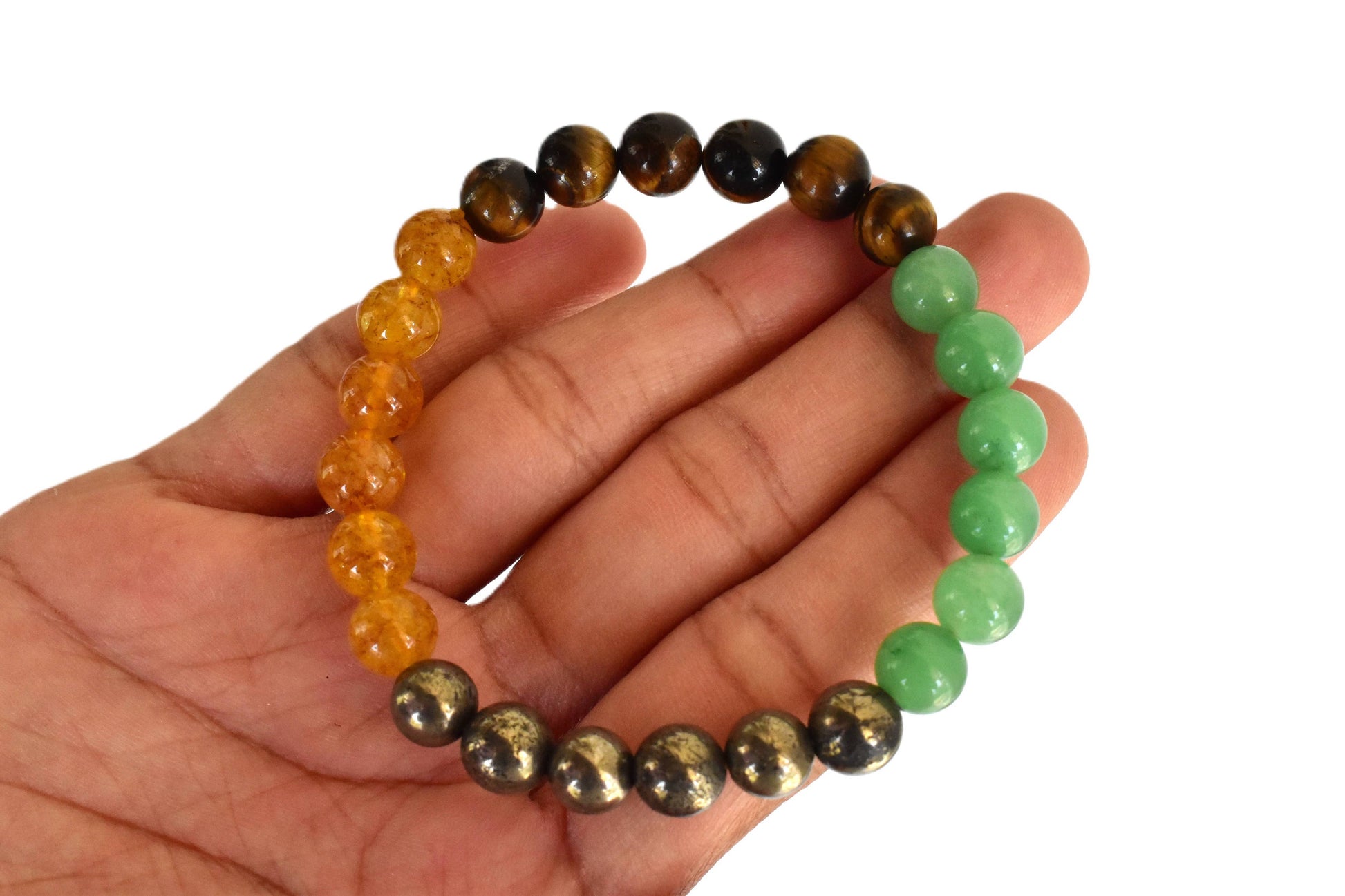Close-up of abundance bracelet showing green aventurine and citrine crystals