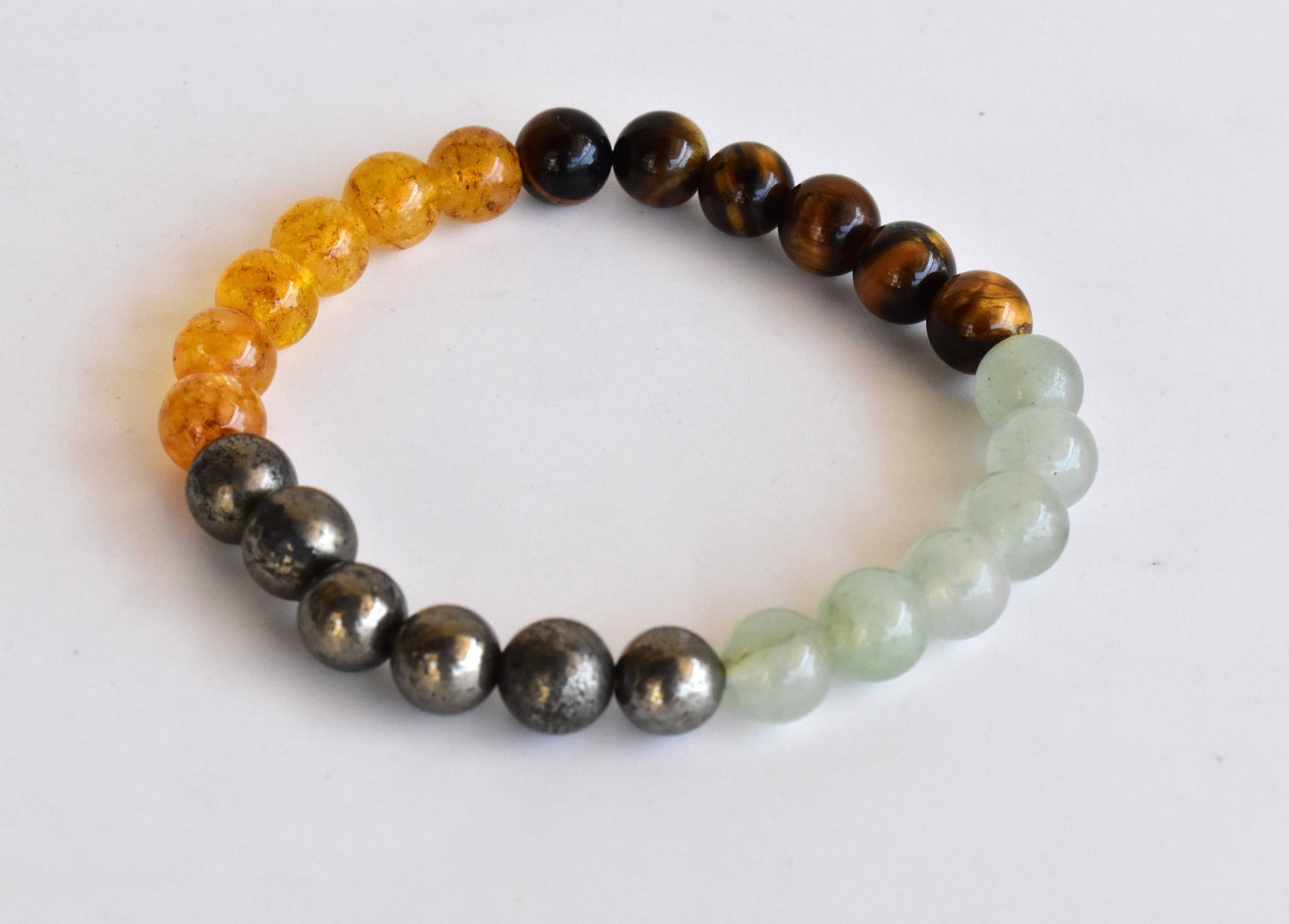 Beaded bracelet with multicolored beads on a white background