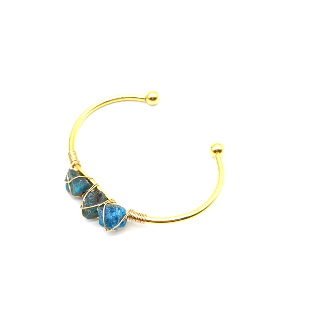 Handmade braided bracelet with [color] natural gemstone crystals
