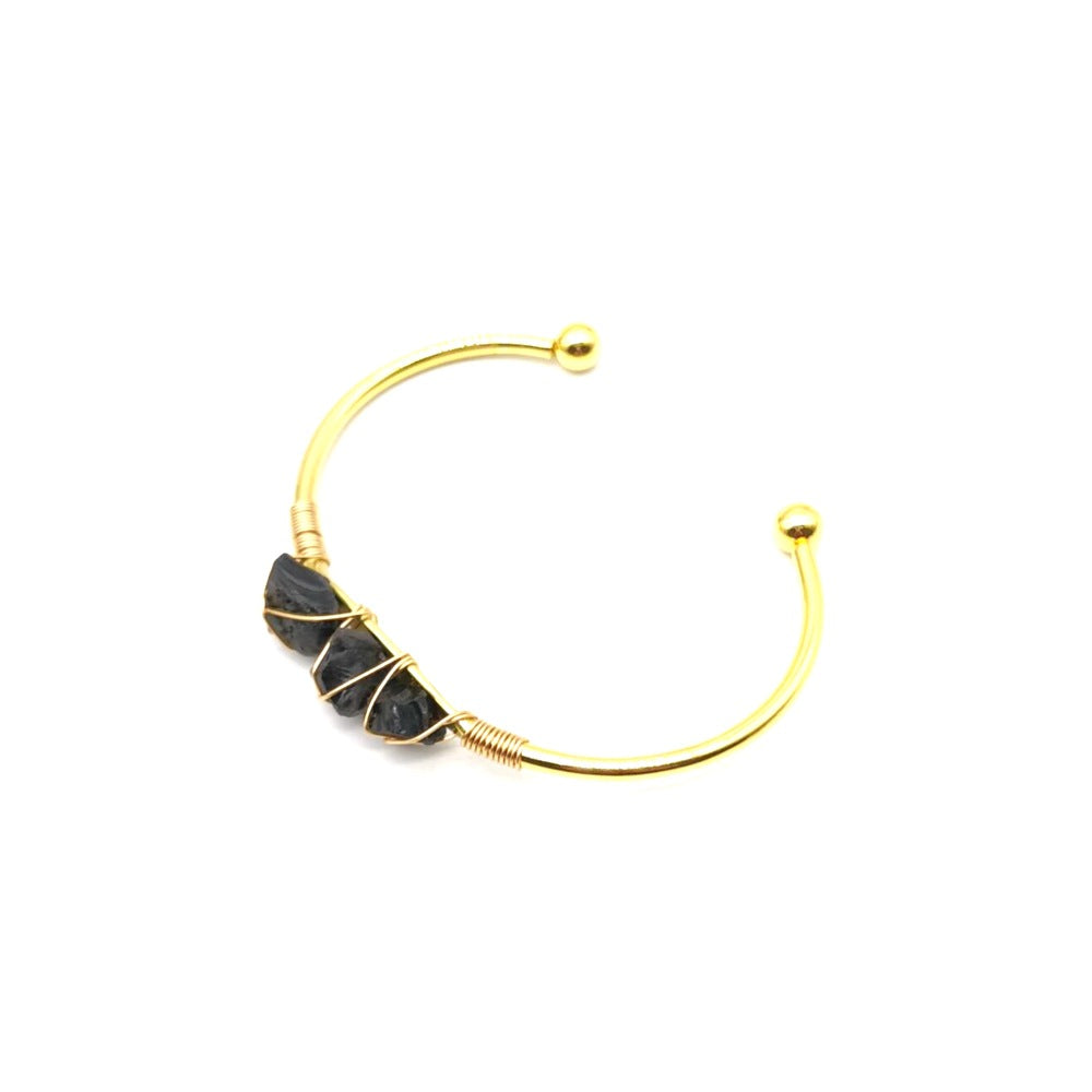 Handmade braided bracelet with [color] natural gemstone crystals