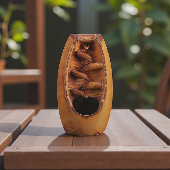 Handcrafted brown clay backflow incense burner with waterfall smoke flow