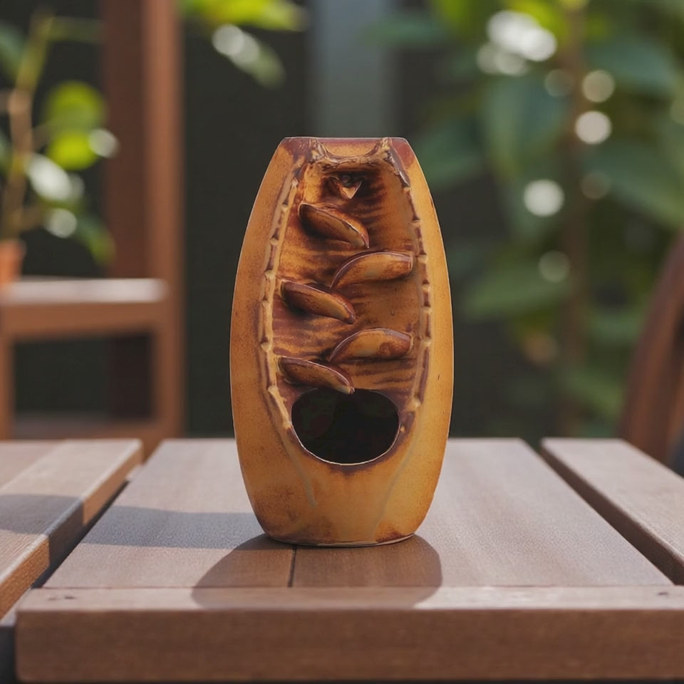 Handcrafted brown clay backflow incense burner with waterfall smoke flow